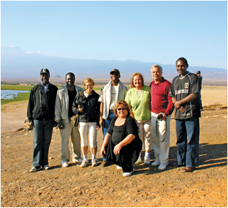A group of people on a scenic background